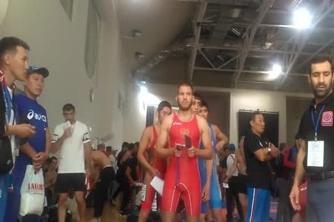 Middle Eastern guys Weigh-in before Wrestling Tournament