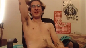 Skinny lad With Glasses stroking his cock